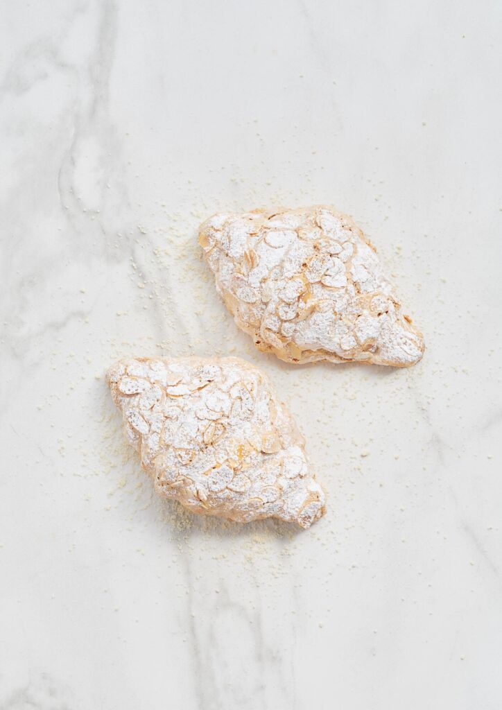 Almond paste filled croissant and almond macaronade glaze | Corman International
